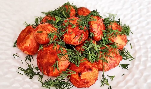 Шампиньоны в томатно-сметанном соусе, запеченные в духовке